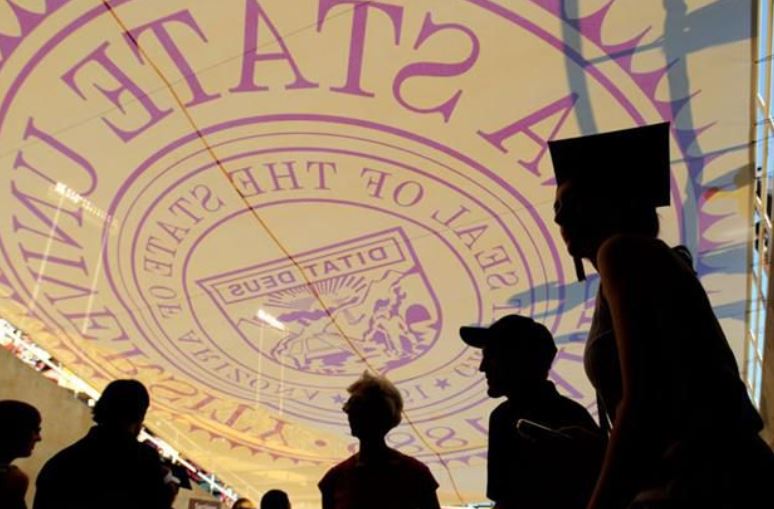 ASU graduates at spring commencement ASU seal and graduates