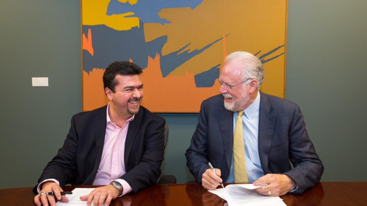 Leonardo Rodriguez Beltran of SENER and ASU Provost Mark Searle sign partnership agreement