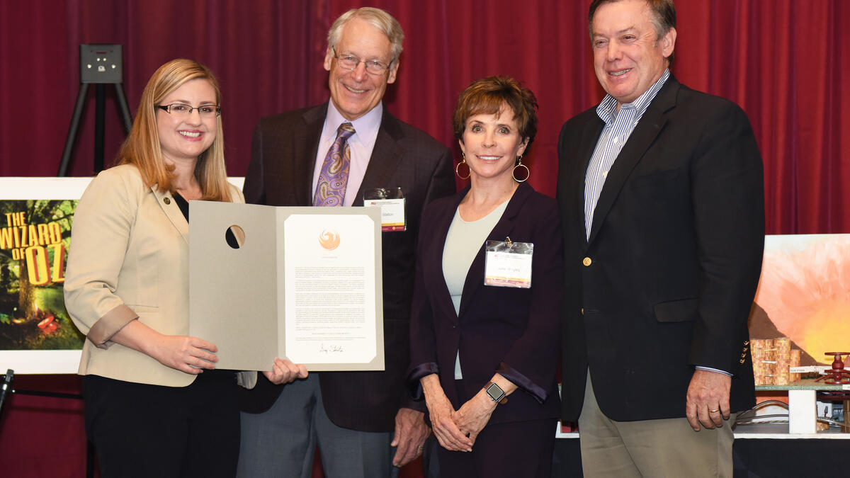 City of Phoenix Vice Mayor Kate Gallego presents a "Sustainability Solutions Month" proclamation to Walton Sustainability Solutions founders