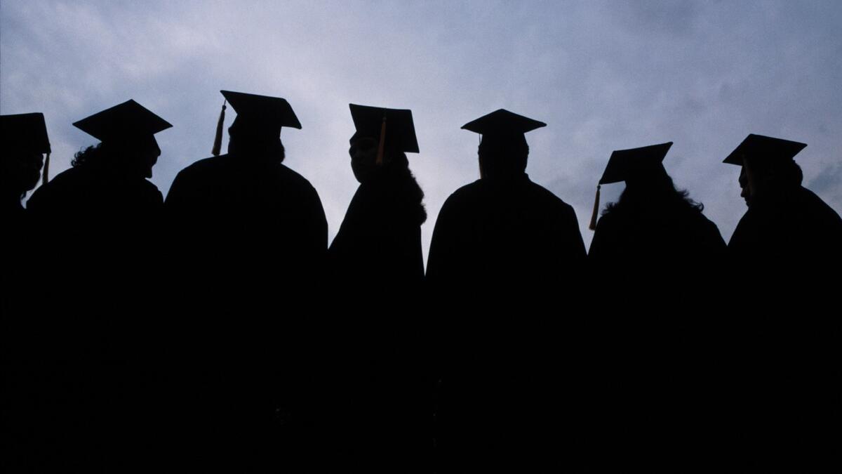 College graduates in shadow profile 
