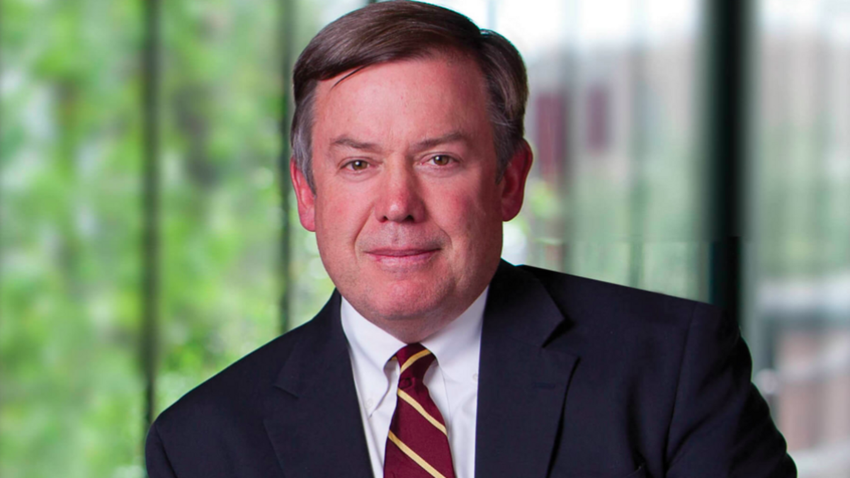 ASU President Michael Crow standing in Fulton Center atrium